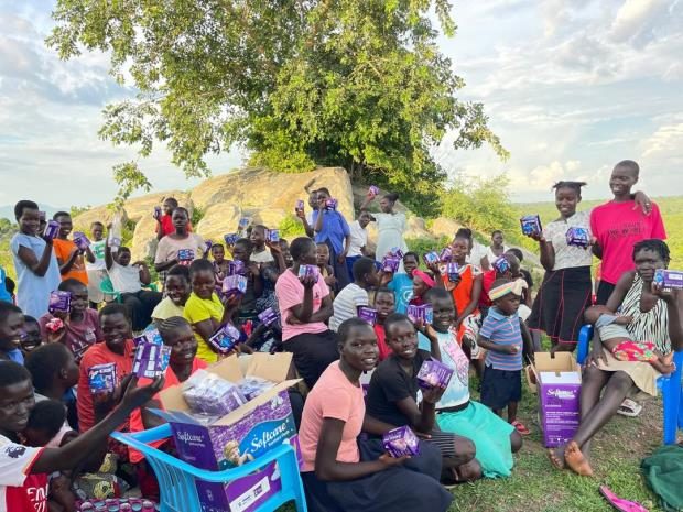 Crowds of young girls and mothers recieved sanitary Kits